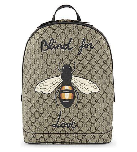Gucci Bee Logo - GUCCI - Bee print GG Supreme backpack | Selfridges.com