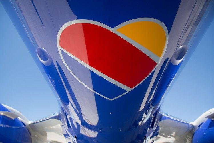 Blue and Red Airline Logo - Southwest Airlines Unveils New Look Echoing Traditional Image - WSJ