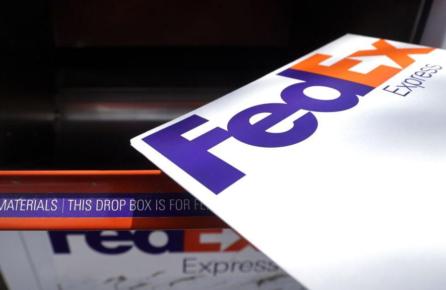 Holiday FedEx Logo - FedEx backs away from holiday surcharges