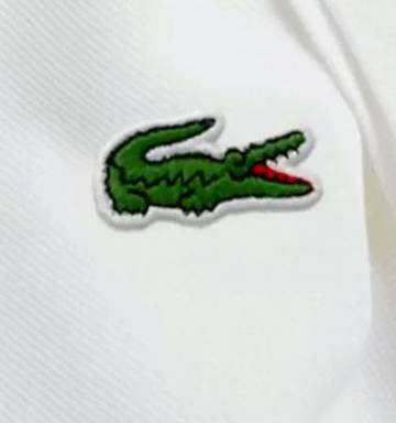 French Crocodile Logo - French sportswear company replaces iconic logo with Kakapo - NZ Herald