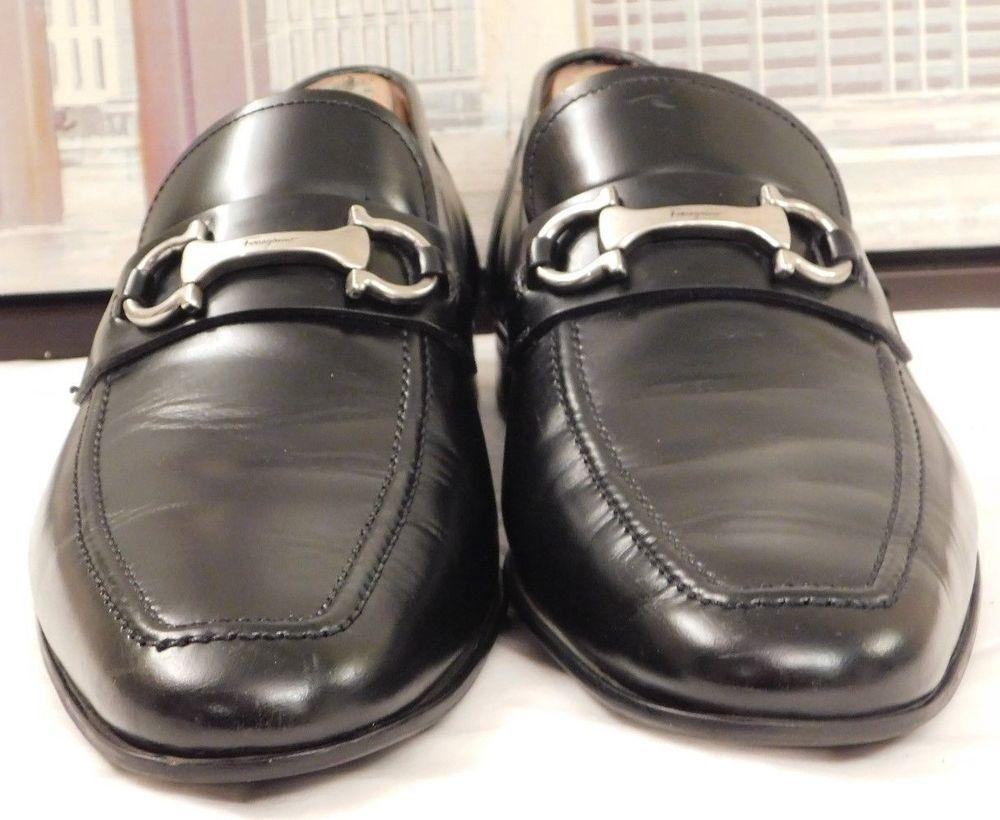 Salvatore Ferragamo black loafers with signature logo hardware