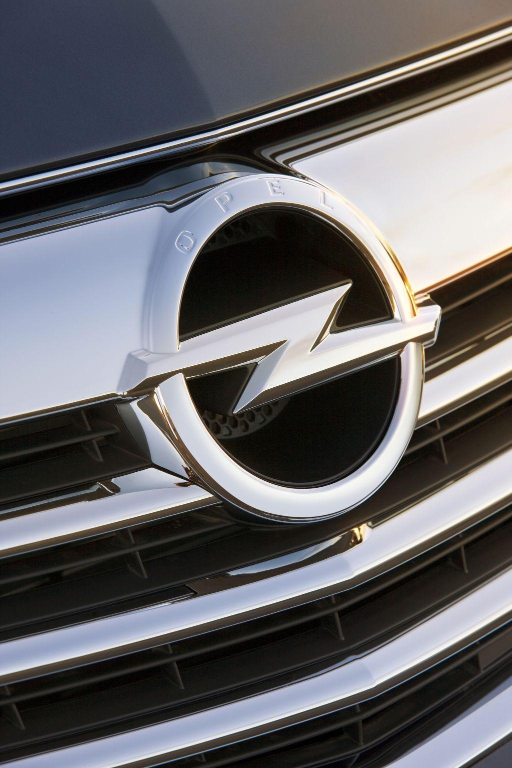 Circle with Lightning Bolt Car Logo - Refined Opel logo expresses brand's new confidence