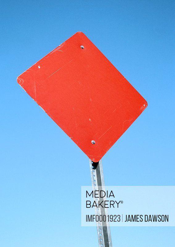 Is That Red Diamond Shape Logo - Mediabakery - Photo by Image Farm - A red, diamond-shaped, blank ...