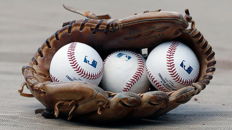 Baseball Glove Bat Logo - MLB players use unique tactics to break in their gloves | MLB.com