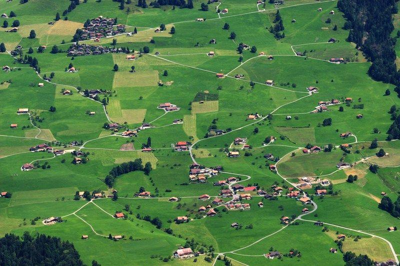 Swiss Farms Logo - Government plan to cut Swiss farm aid causes friction in Bern