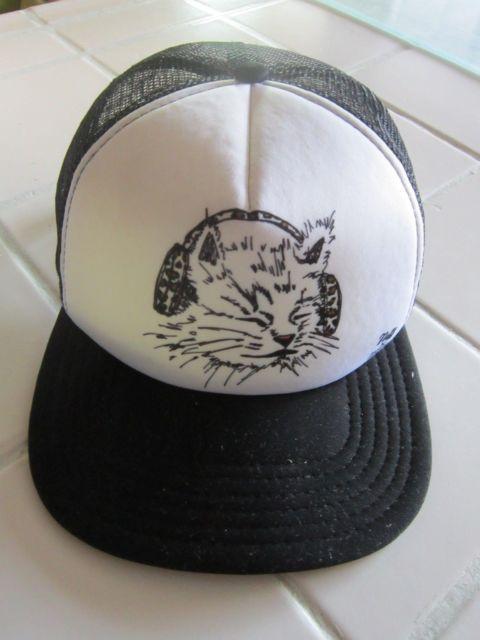 Cat with Headphones Logo - Neff x Austin Carlile trucker hat. Headphones Cat Logo