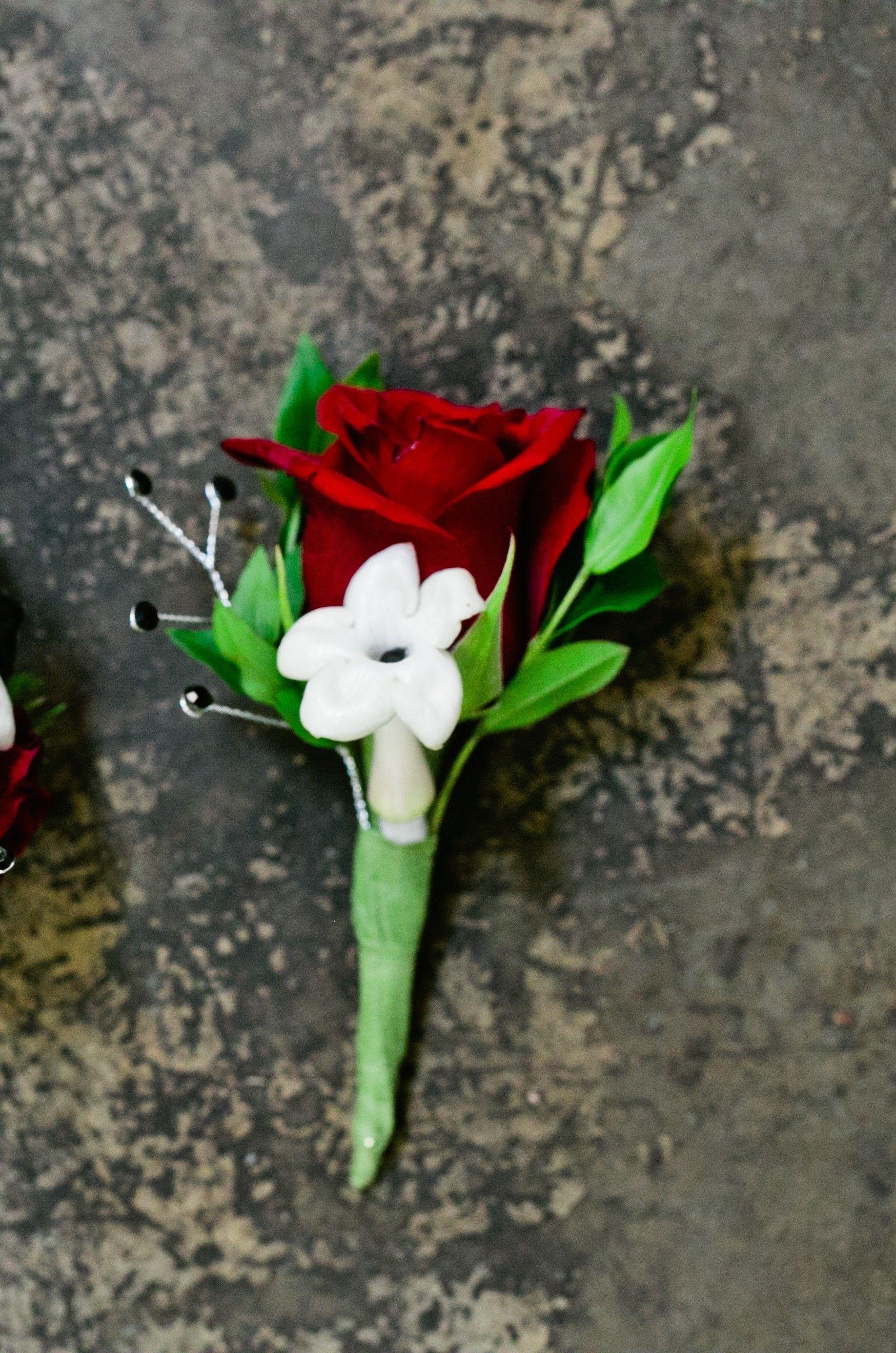 Green Petal Flower Company Red Logo - Romeo and Juliet Boutonniere in Davis, CA | Strelitzia Flower Company