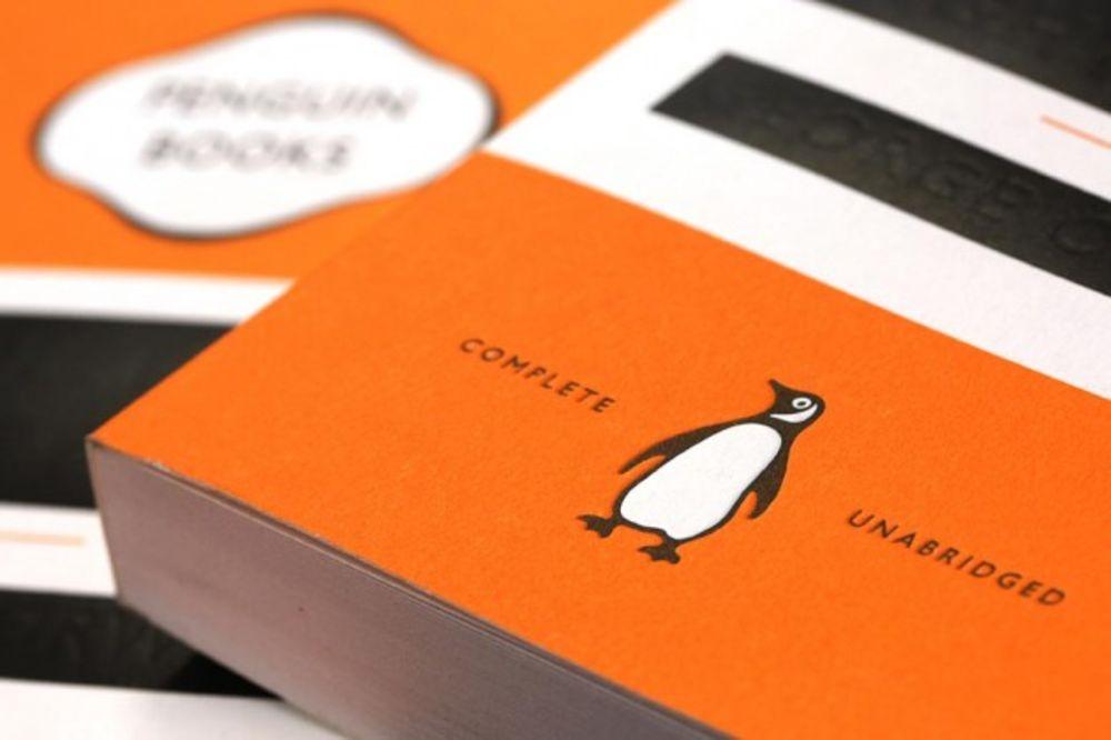 Penguin in Orange Oval Logo - The Story Behind Penguin Books' Beloved Bird - Bloomberg