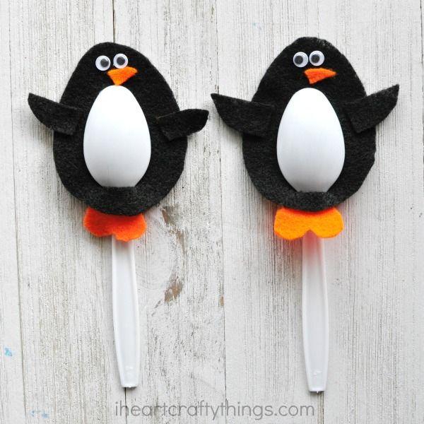 Penguin in Orange Oval Logo - Plastic Spoon Penguin Craft | I Heart Crafty Things