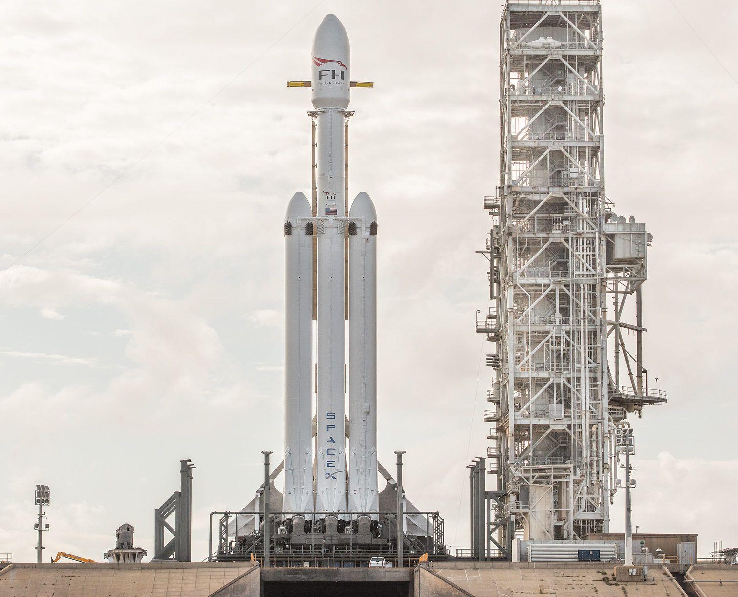 Verical SpaceX Falcon Heavy Logo - SpaceX gets ready to fire up Falcon Heavy for the first time at Cape ...