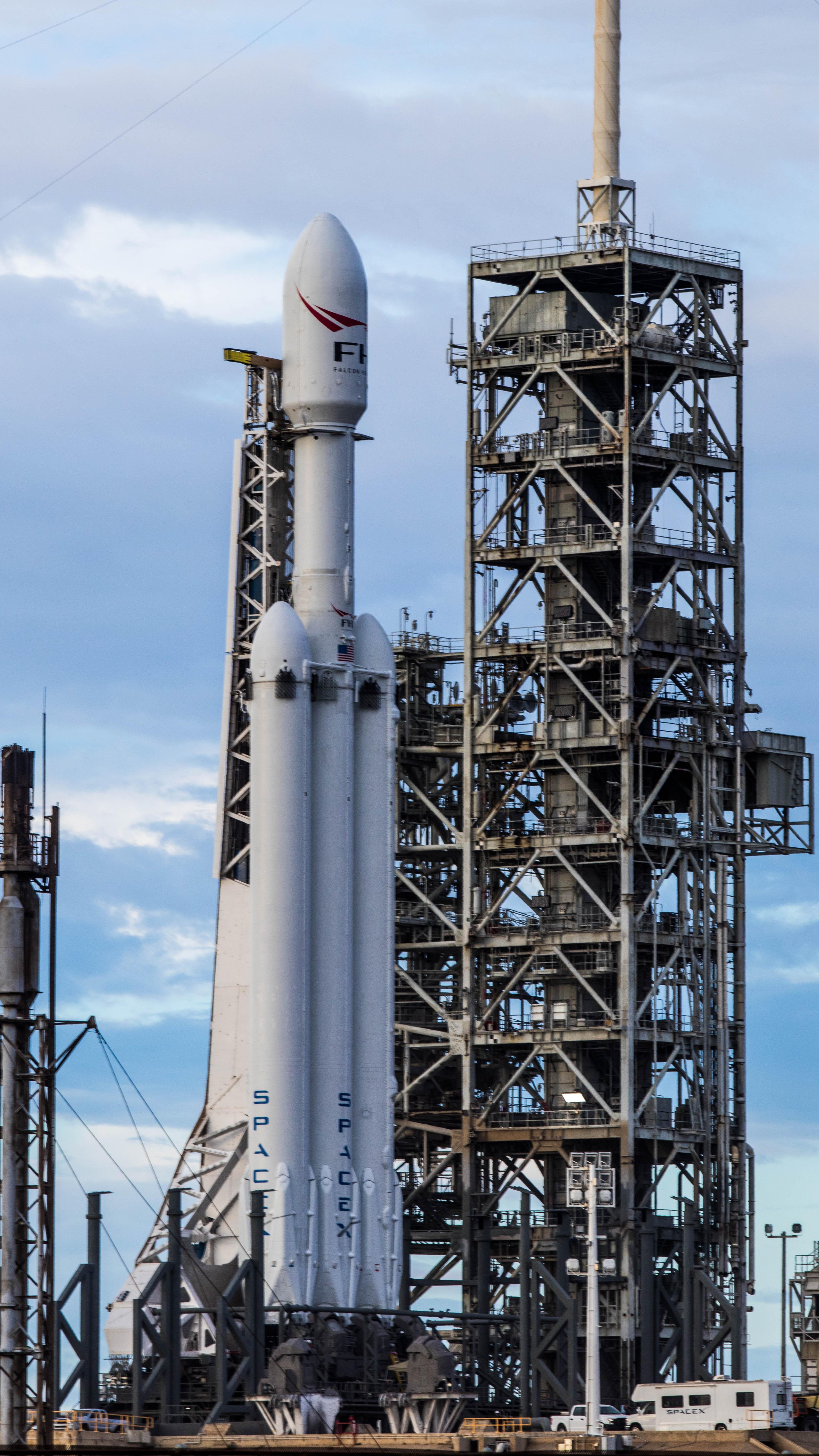 Verical SpaceX Falcon Heavy Logo - OC SpaceX Falcon Heavy vertical on the pad for wet dress rehearsal