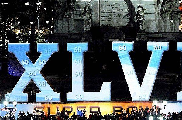 XLVI Logo - Who Will Win Super Bowl XLVI