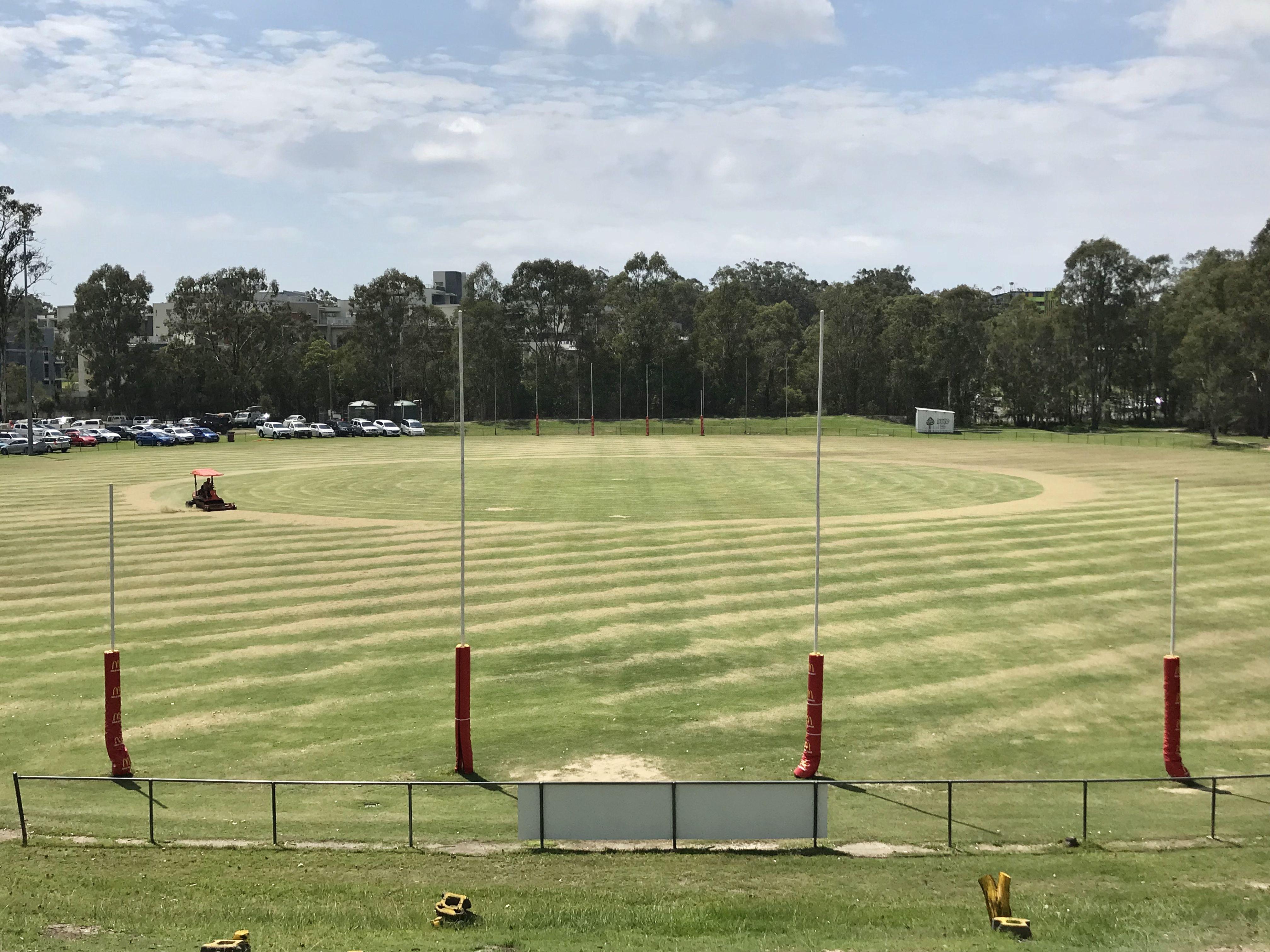 Grass Oval Logo - File:Mowing grass at Southport Sharks oval, Australian rules ...