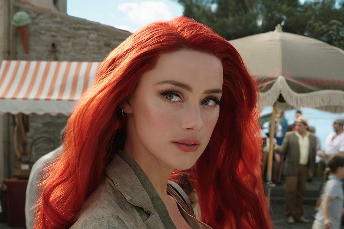 Red Haired Woman Logo - Aquaman Trailer: See Amber Heard and Her Giant Red Wig - Racked