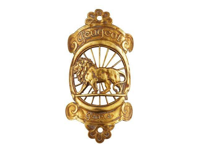 Brass Lion Logo - Peugeot Lions | History of Peugeot | Peugeot UK