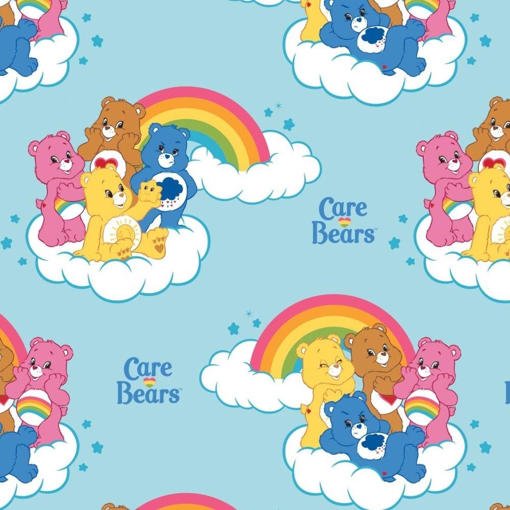 Rainbow Cloud Logo - Care Bears Rainbow in Blue Care Bear Logo Rainbows Cloud Cotton Fabric
