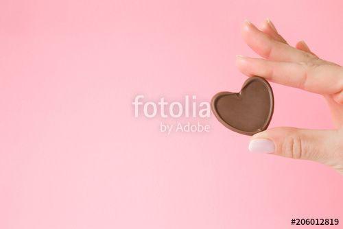 Pastel Heart Logo - Beautiful, perfect, groomed woman's hand holding chocolate heart ...