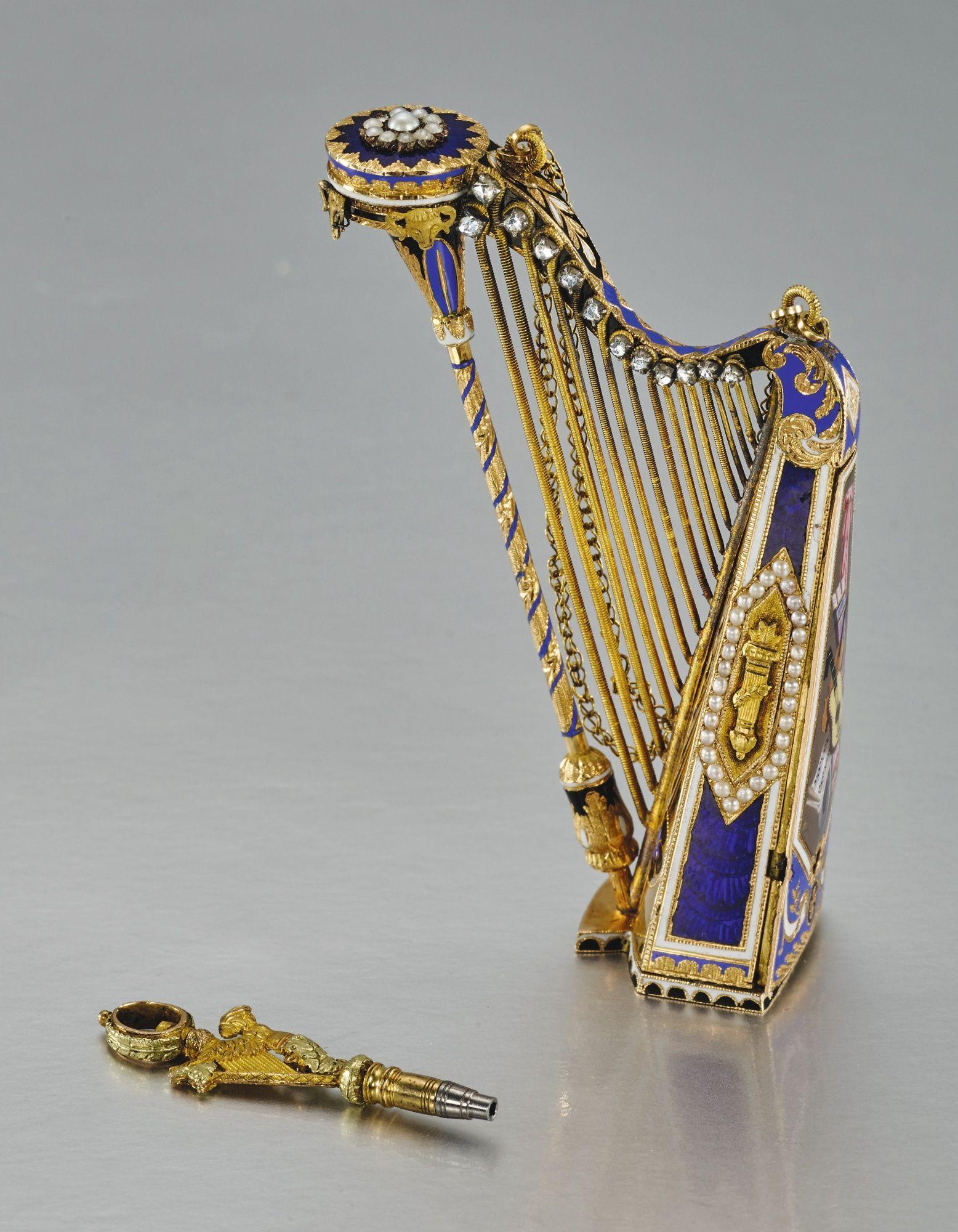 Blue with Gold Harp Logo - Swiss A GOLD ENAMEL AND PEARL SET MUSICAL HARP CIRCA 1800