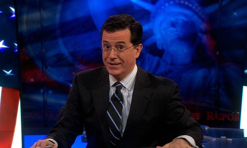 Stephen Colbert Report Logo - VIDEO] Stephen Colbert Sells Michael Stipe And Other Props As 'The ...