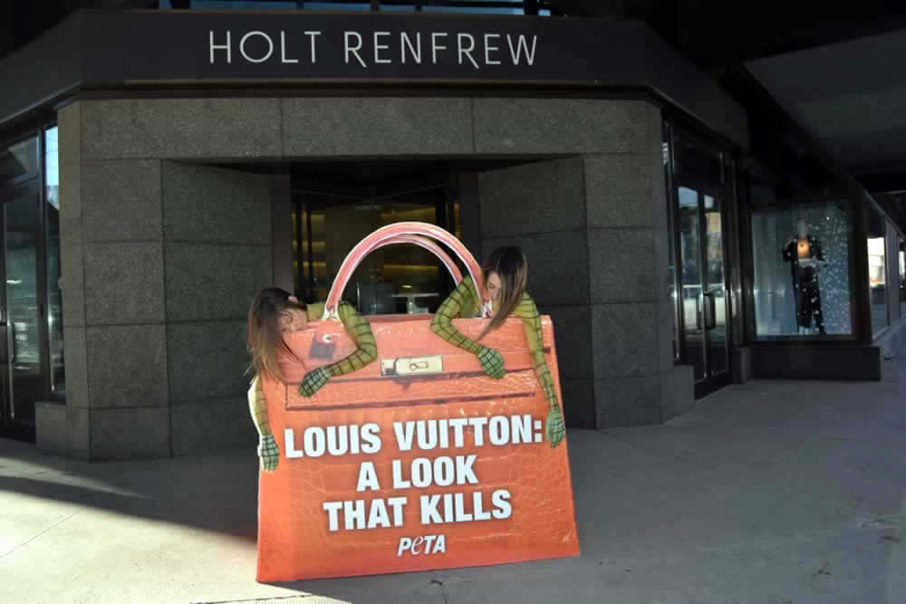 Crocodile Shopping Logo - Bodypainted 'Crocodiles' Crawl Out of Giant Louis Vuitton Bag and ...