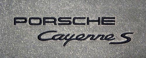 Cayenne S Logo - Porsche Cayenne Logo Floor Mats - PartCatalog.com