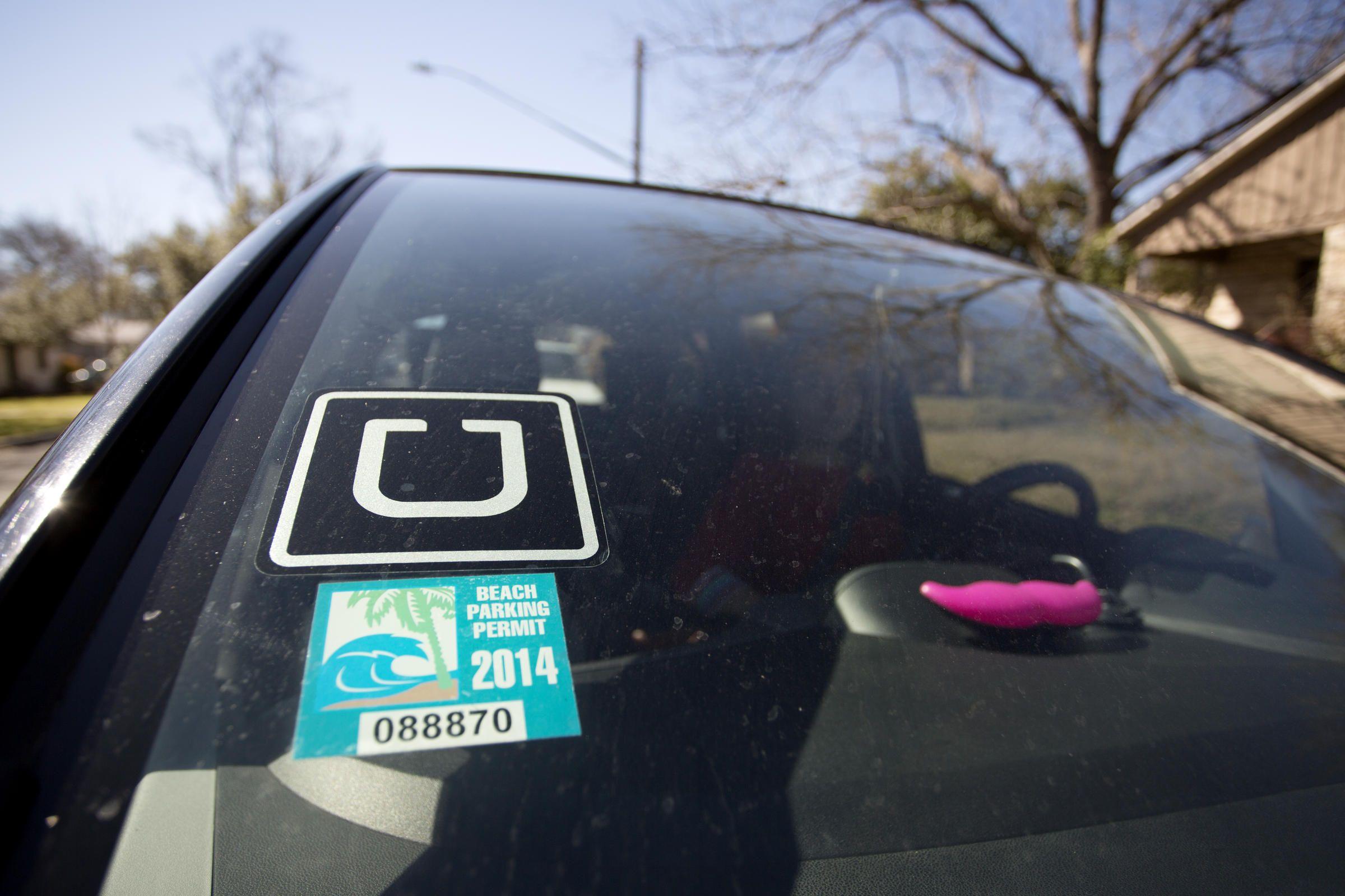 Current Uber Windshield Logo - One Current City Law Goes Unfollowed by Uber and Lyft Drivers | KUT