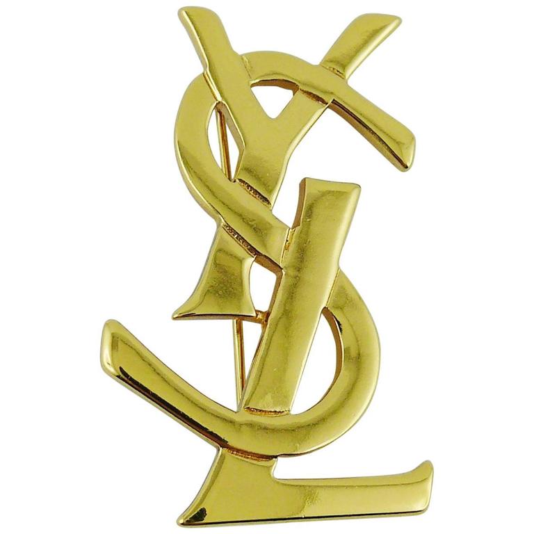 YSL Gold Logo - Yves Saint Laurent YSL Gold Toned Logo Brooch For Sale at 1stdibs