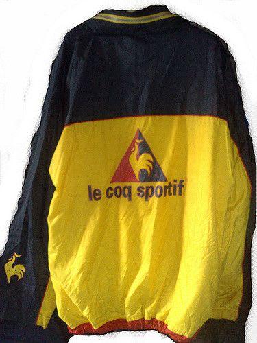 Red Yellow and Blue Ha Logo - Red, Blue, Yellow Coq Sportif Jacket (Rear). If you ha