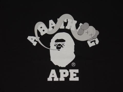 Kaws X BAPE Logo - BAPE Heads: T-Shirt - BAPE x KAWS - College (Black)
