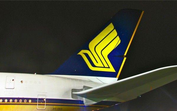 Yellow Bird Airline Logo - The Tail This Big Bird Soars Feet Air Long | Logot Logos