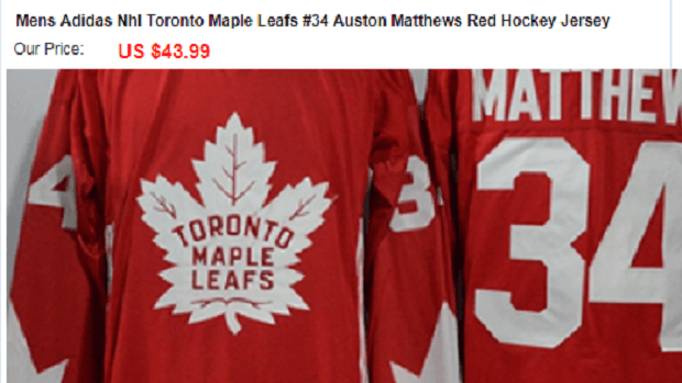 Red Maple Leaf Hockey Logo - 5 bizarre and fake NHL designs showing up on knock-off jersey ...