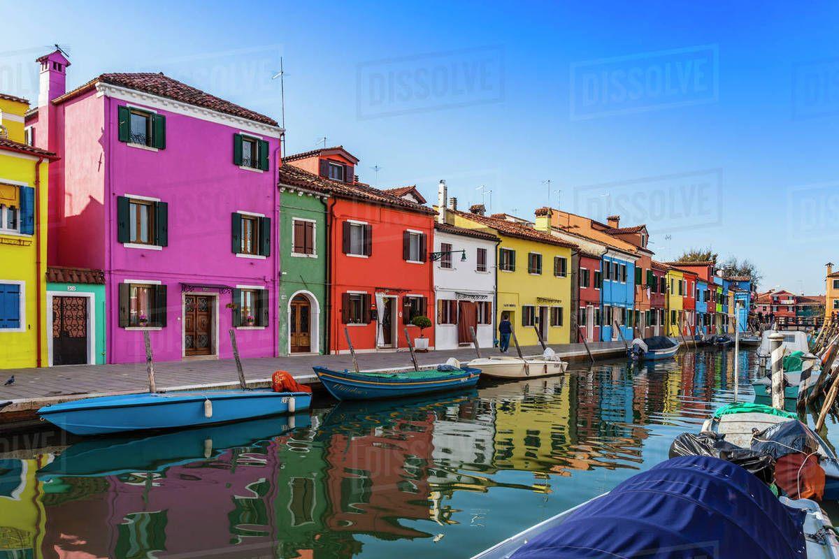 Multi Colored House Logo - Multi-colored houses and boats on canal waterfront, Burano, Italy ...