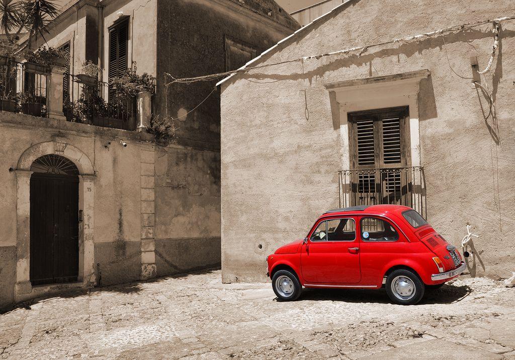 Little Red Car Logo - Little Red Car. An old model Fiat 500 in the city of Noto i