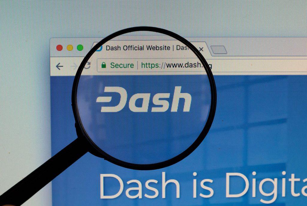 Dash Logo - Dash logo on a computer screen with a magnifying glass | Flickr
