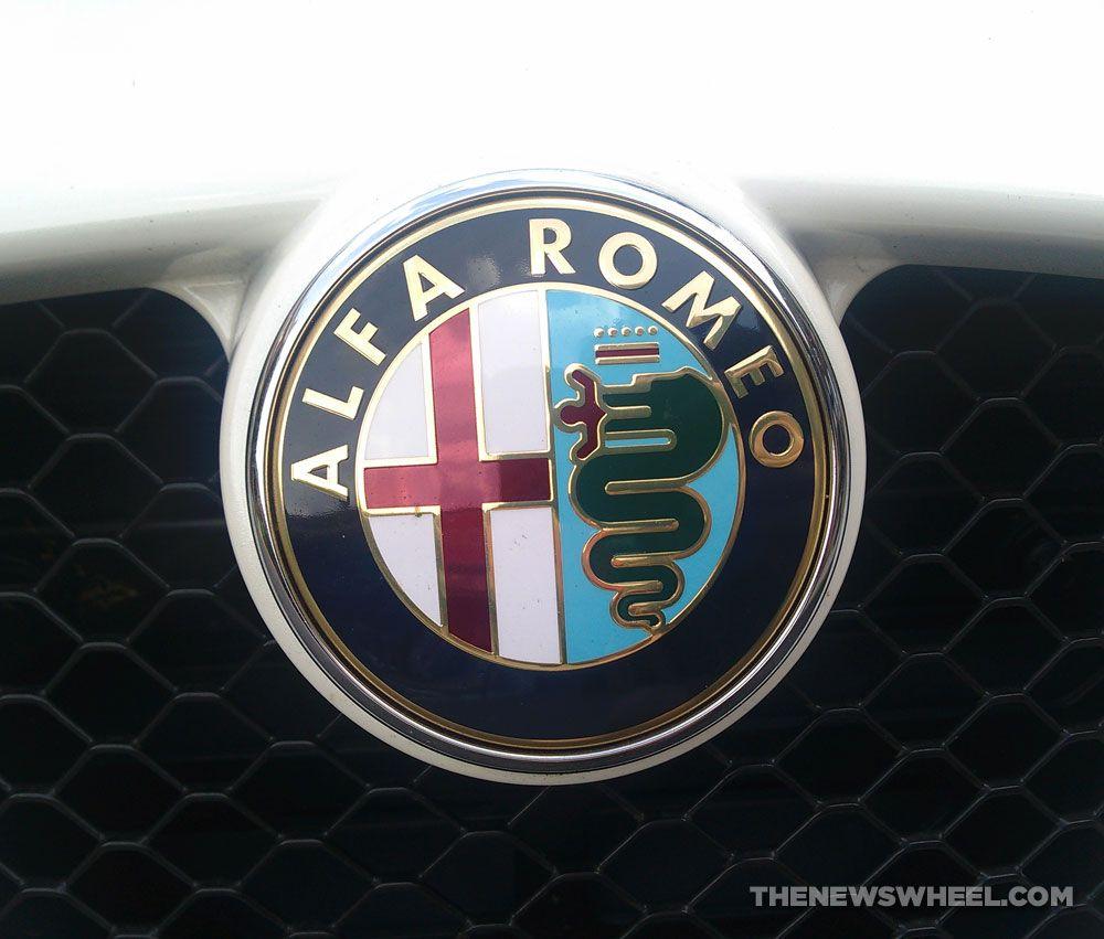 Alfa Romeo Logo - Behind the Badge: Why Alfa Romeo's Logo Features a Snake Eating a