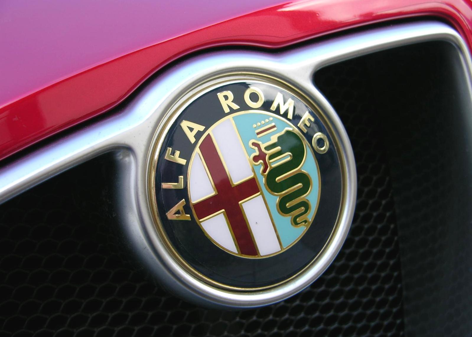 Alfa Romeo Logo - Behind the Badge: Why Alfa Romeo's Logo Features a Snake Eating a