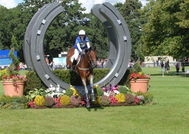 Horse Jumping through Horseshoe Logo - Box office for Land Rover Burghley Horse Trials opens