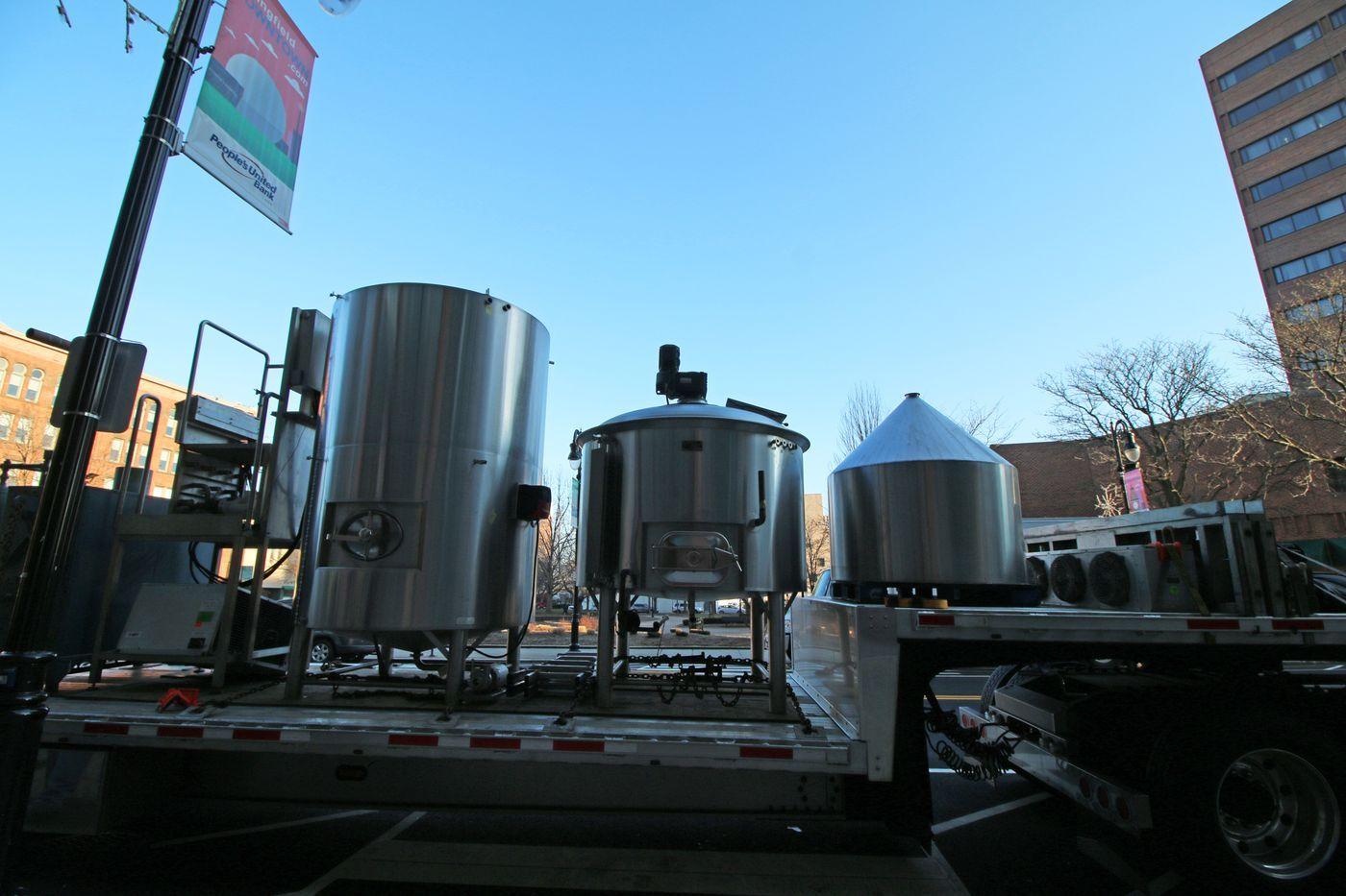 White Lion with Blue Square Logo - White Lion Brewery moves equipment into Tower Square in downtown