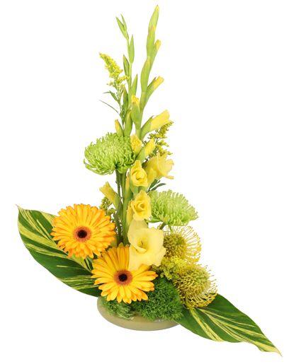 Yellow Flower Candy Company Logo - Wings of Gold Floral Arrangement in Cedar City, UT - Boomer's ...