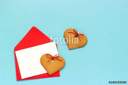 Looks Like White and Red Envelope Logo - Red envelope with blank white card for text and heart shaped ginger