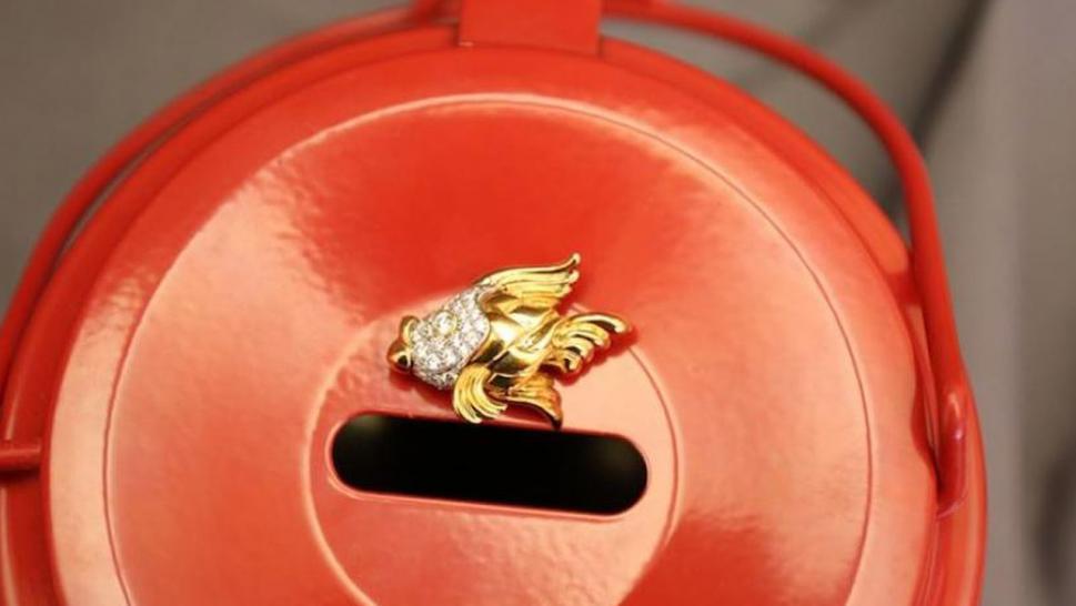 Woman Inside Diamond Logo - Woman Anonymously Donates $5,000 Brooch to Salvation Army to Spread ...