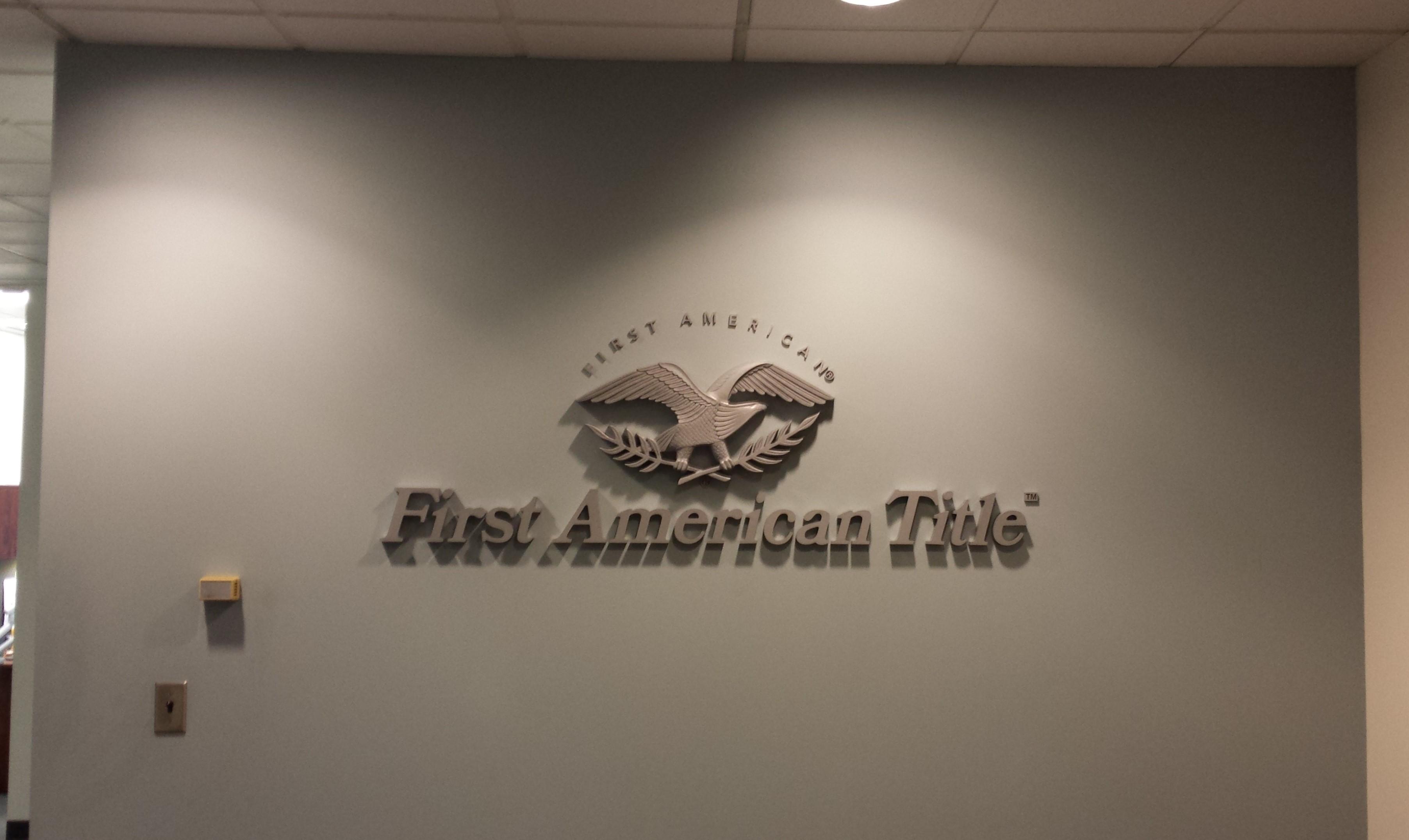 First American Title Logo - Interior feature wall sign for First American Title Company