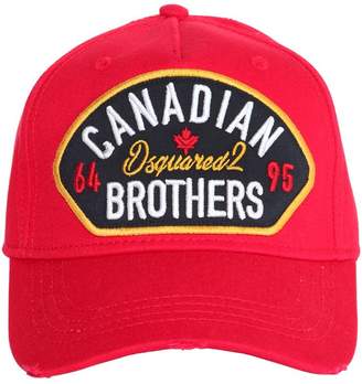 Man with Red Hat Logo - Canadian Brothers Patch Baseball Hat