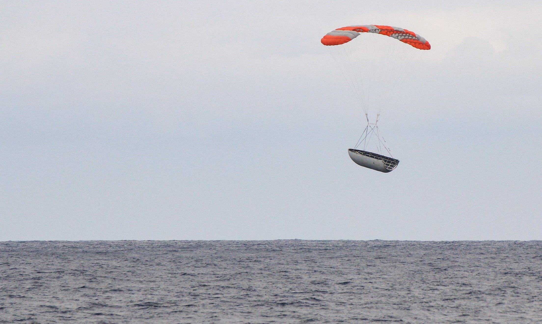 SpaceX Fairing Logo - SpaceX photos reveal Falcon 9 fairings parasailing to Pacific splashdown