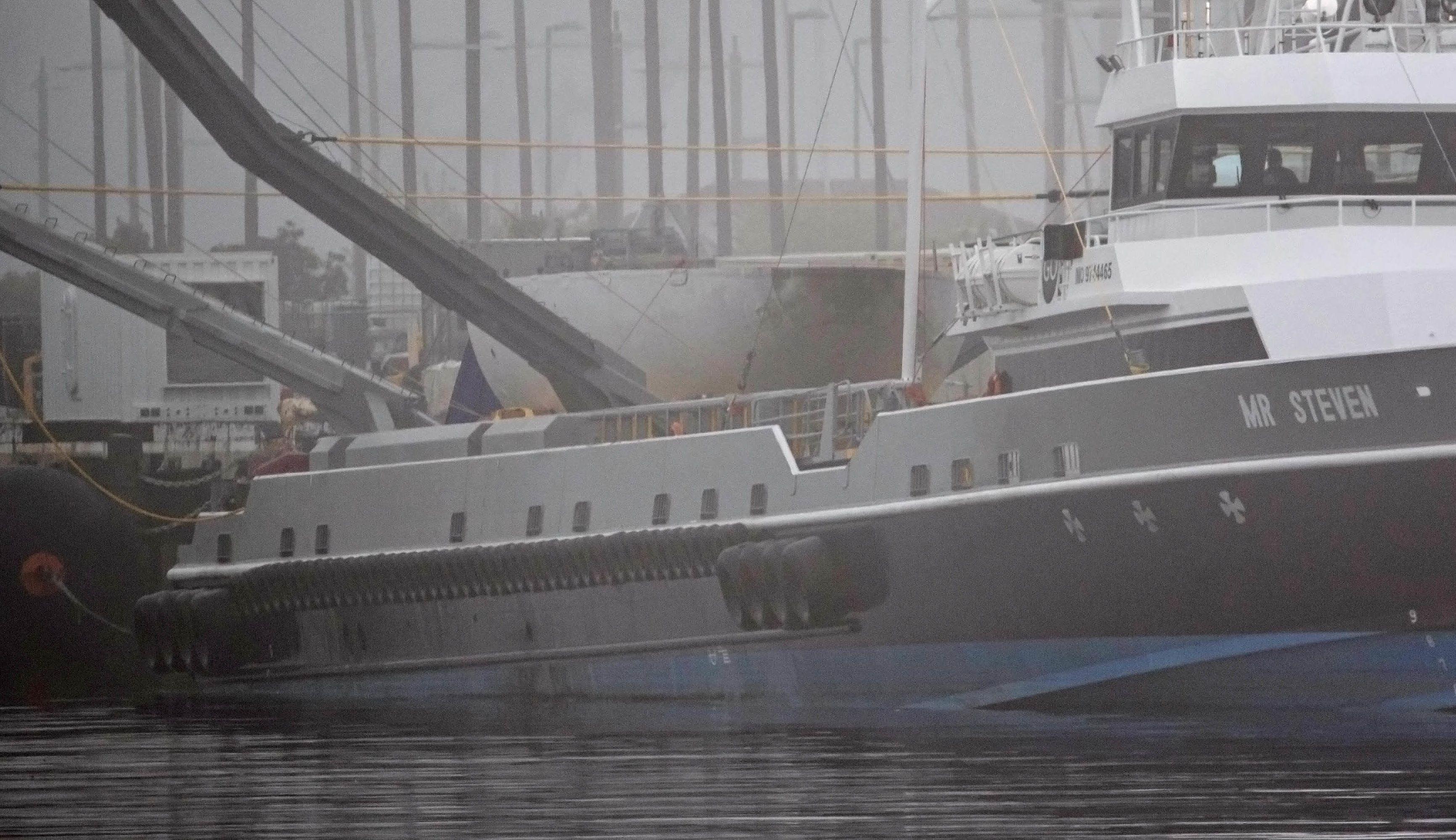 SpaceX Fairing Logo - SpaceX returns intact fairing half on clawboat in post-launch surprise