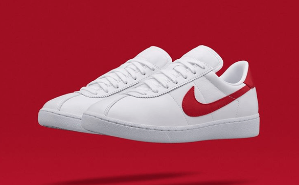 red nike shoes with white swoosh
