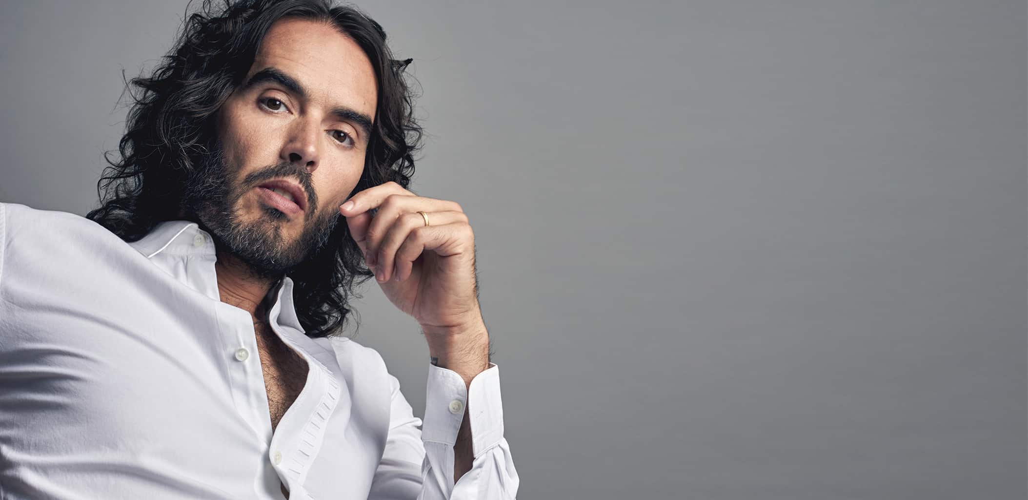 Russell Brand White Logo - The Second Coming of Russell Brand