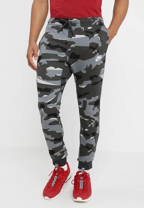 Nike Gray Camo Logo - Nike Sportswear CLUB CAMO - Tracksuit bottoms - cool grey/anthracite ...