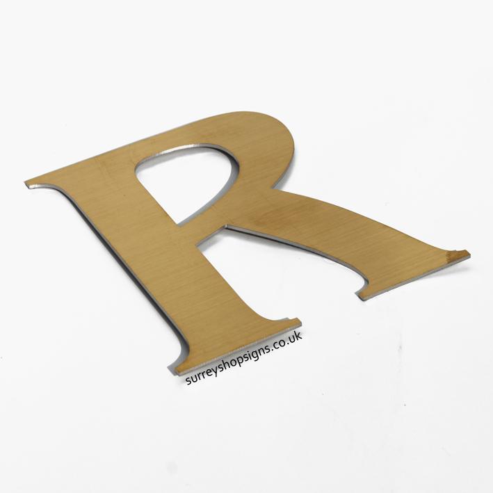 Golden Letter S Logo - Brushed Gold Effect Shop Sign Letters - Surrey Shop Signs