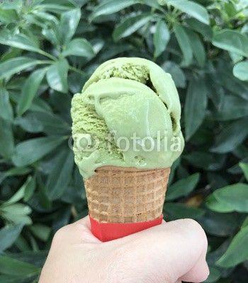 Ice Cream Green Leaf Logo - Hand holding green tea ice cream cone with blurred image background ...